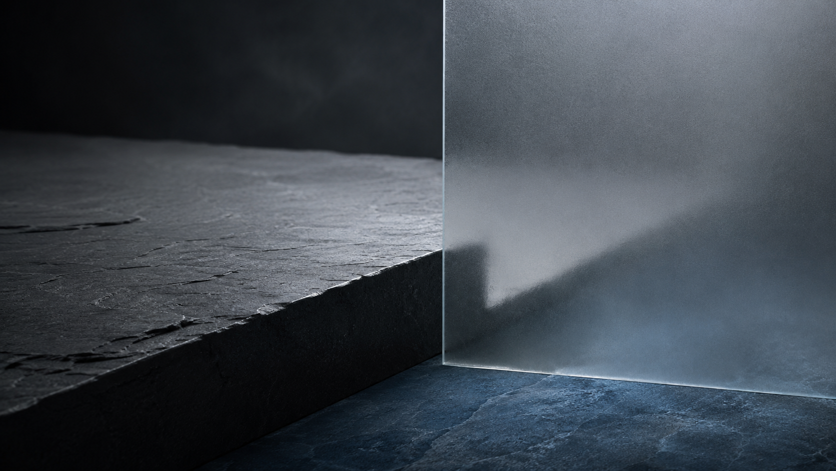 A dark stepped slate surface partly obscured by a sheet of frosted glass, suggesting a visible decline whose exact magnitude remains uncertain.